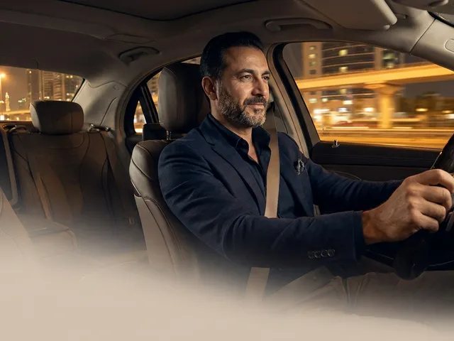 Designated driver in Dubai driving a client home safely in their own car at night